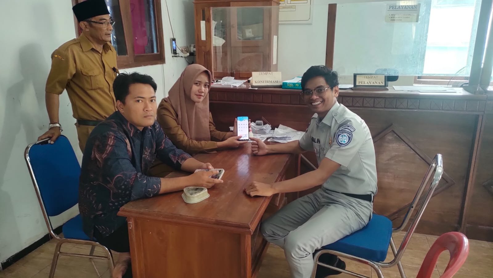 Jasa Raharja Malang Gelar Giat Sosialisasi Aplikasi JRku Bersama Perangkat Desa Tlogorejo Pagak